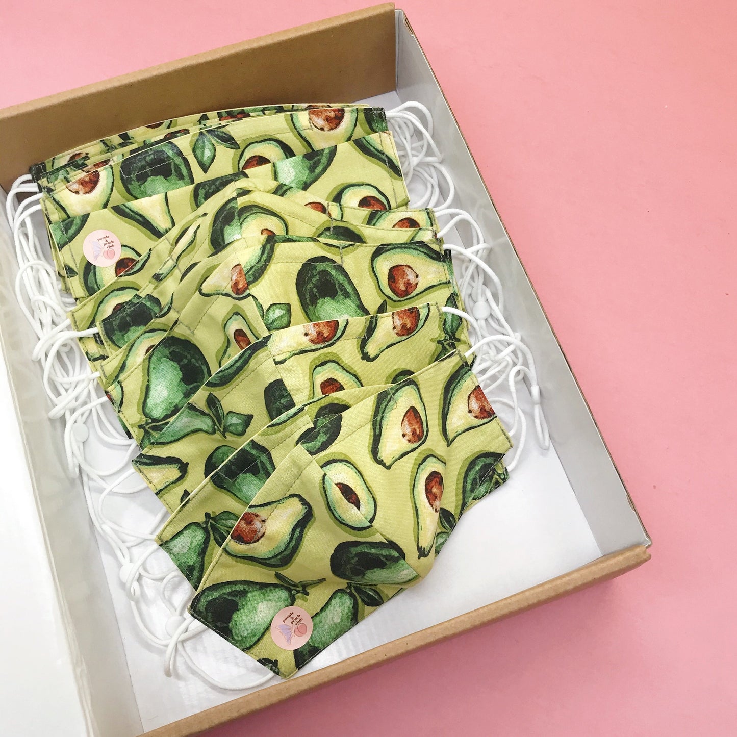 Freshen up your look with this lively green avocado mask. Made with one of our heavier-weight cotton novelty fabrics to provide a sturdier outer shell and the ultimate combination of both structure and comfort. Reversible and double-layered. Built with an adjustable nose bridge and adjustable ear straps.