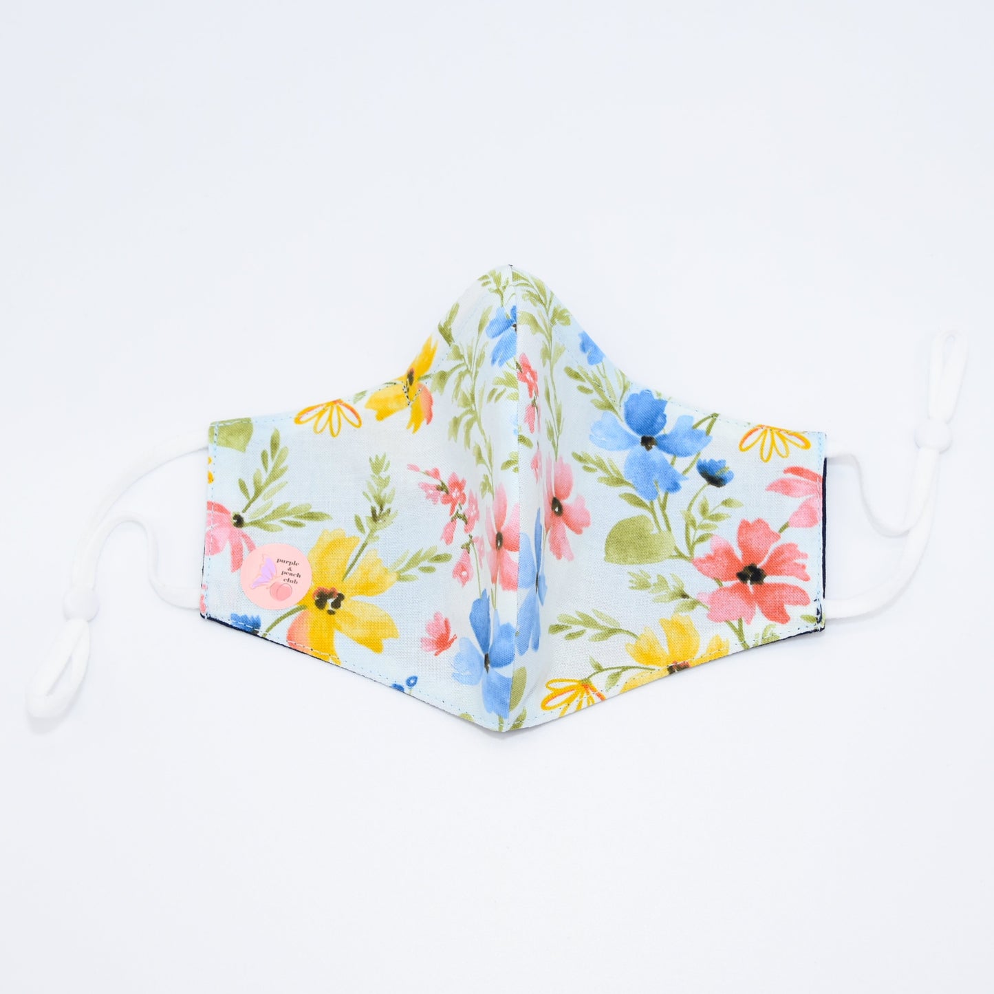 Multicolor Spring Flowers Print on Soft Blue Reversible Face Mask
